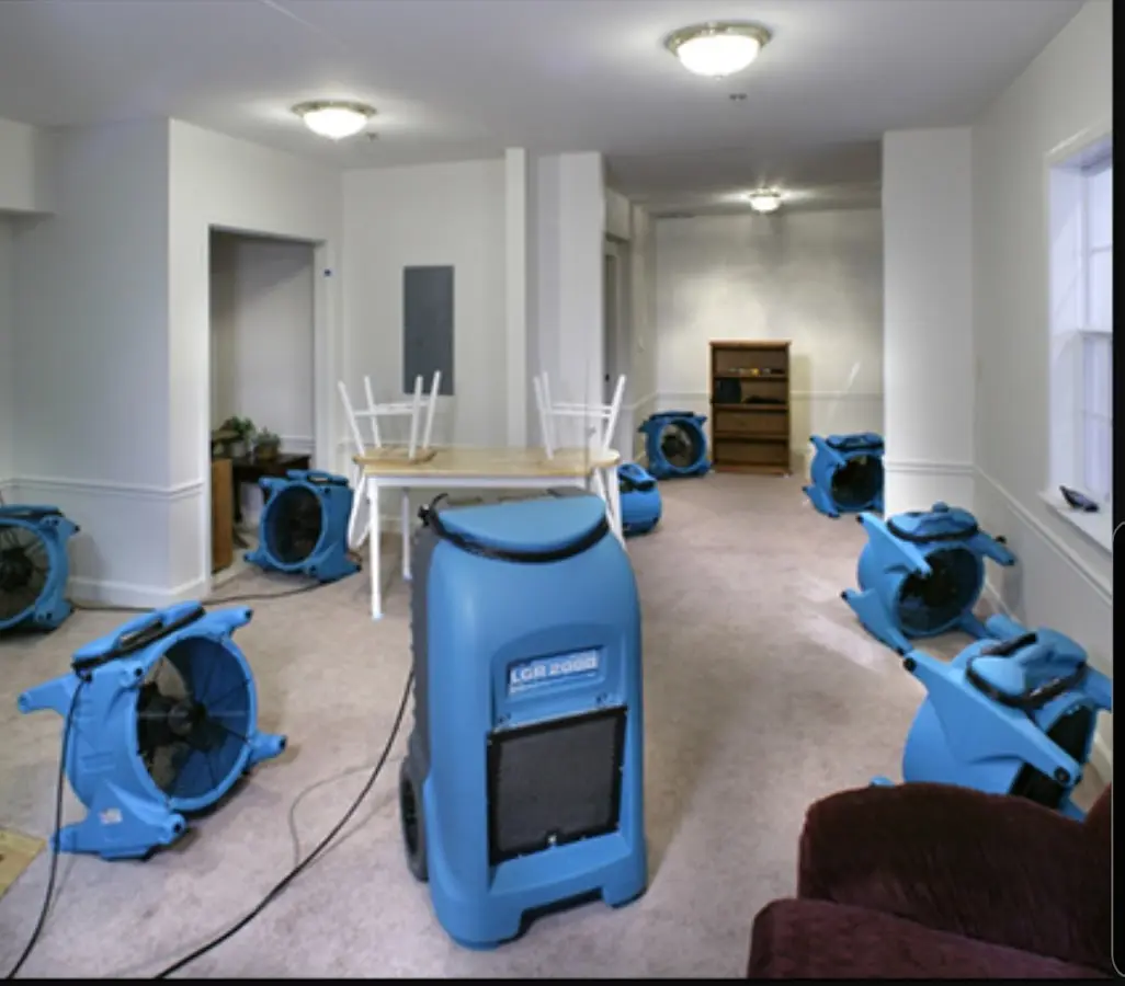 Air movers and dehumidifier setup for Water Damage Restoration in Rice Lake